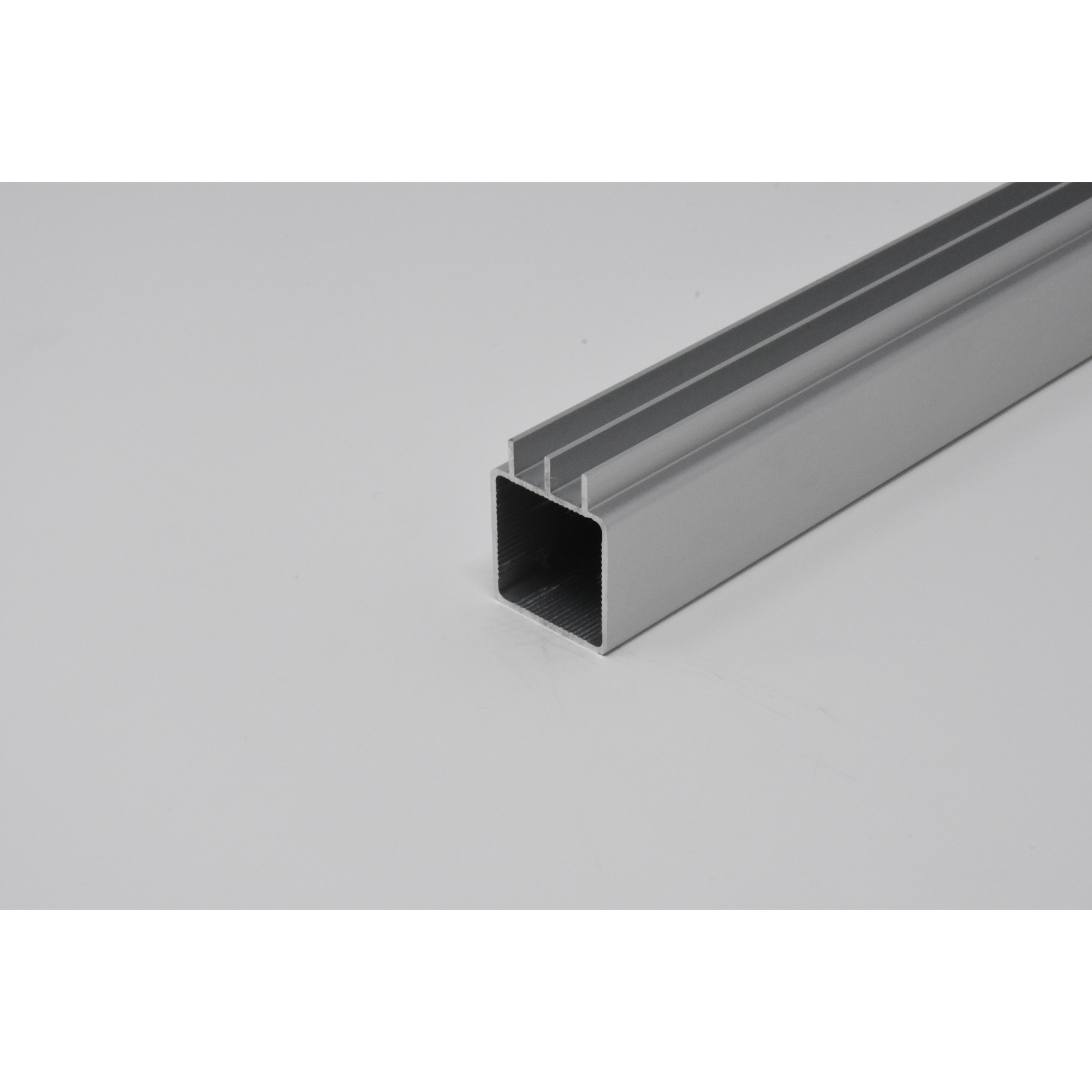 EZTube Lower Sliding Door Track — Extruded Aluminum, 94in. L x 1in. W x 1in. H, Fits 1/4in. Panel, Silver, Model# 100-240L-1QR-94